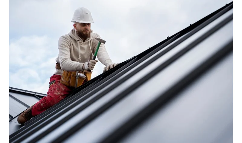 storm damage roof repair in Lansing