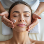 Woman with serene expression receiving a gentle sensitive skin facial from an esthetician, emphasizing relaxation and expert care.