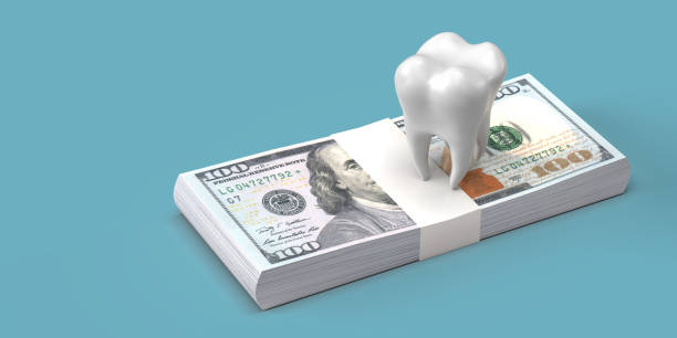 A tooth model over a stack of cash